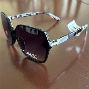 Nanette Lepore 100% UV protect,black frame,tortoise arms,black lens sunglasses